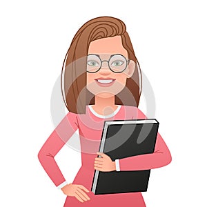 A beautiful girl in glasses stands with a book in her hand. Portrait of a happy confident successful young woman