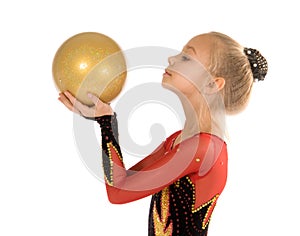 Beautiful girl gymnast with a ball