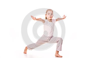 Beautiful girl gymnast exercising, stretching