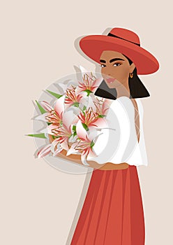 Beautiful girl in a hat with lily flowers in her hands