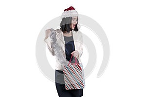 Beautiful girl hat santa gift bag celebration, young