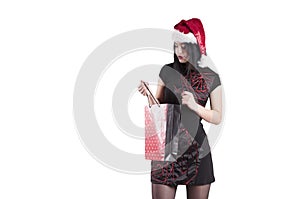 Beautiful girl hat santa shopping bags purchase isolated