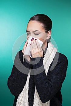 Beautiful girl having winter cold season symptoms concept