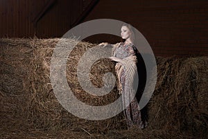 Beautiful girl in the hayloft