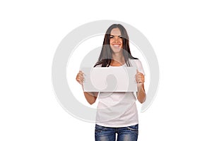 Beautiful girl holding a blank billboard