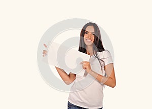 Beautiful girl holding a blank billboard