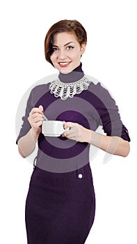 Beautiful girl holding a cup of coffee (tea)
