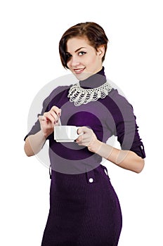 Beautiful girl holding a cup of coffee (tea).