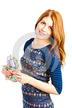 Beautiful girl holding paper money