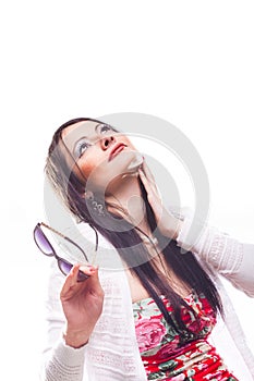 Beautiful girl holding sunglasses