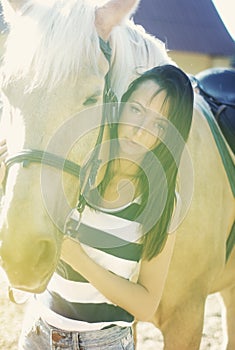 Beautiful girl with a horse