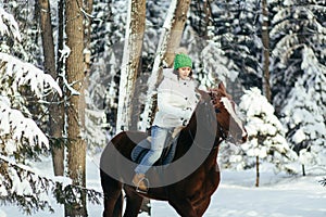 beautiful girl and horse in winter