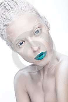 Beautiful girl in the image of albino with blue lips and white eyes. Art beauty face.