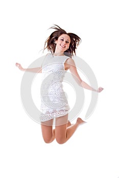 Beautiful girl jumping of joy