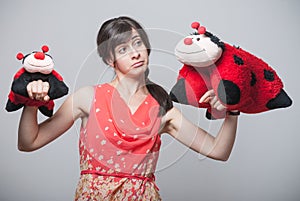 Beautiful girl with ladybugs on her hands