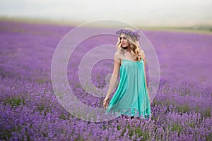 Beautiful girl on the lavender field