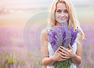 Beautiful girl on the lavender field