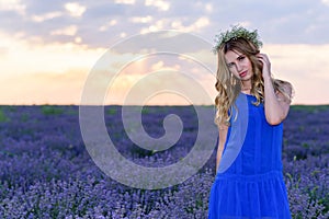 Beautiful Girl in lavender Field at sunset