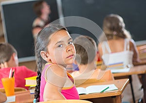 Beautiful girl during lesson at school
