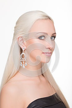 Beautiful girl with long white hair and earrings