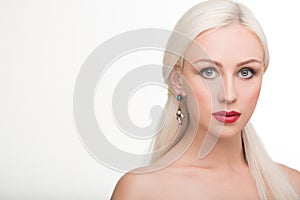 Beautiful girl with long white hair and earrings
