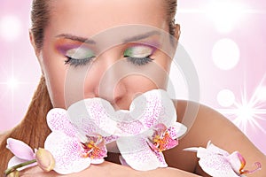 beautiful girl with make-up with orchid