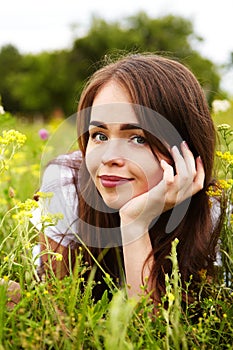 Beautiful girl in a meadow