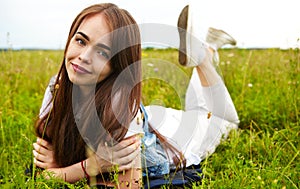 Beautiful girl in a meadow