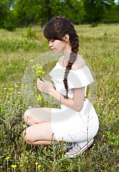 Beautiful girl in a meadow