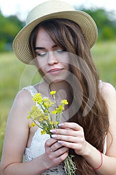 Beautiful girl in a meadow