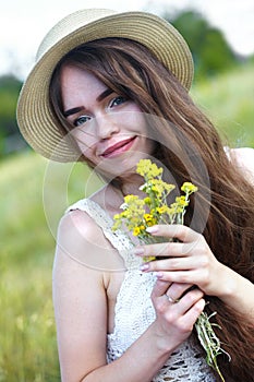 Beautiful girl in a meadow