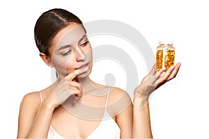 Beautiful Girl With Pill With Cod Liver Oil Omega-3 photo