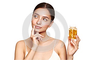 Beautiful Girl With Pill With Cod Liver Oil Omega-3 photo