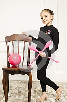 Beautiful girl with Pink Rhythmic gymnastics hoop