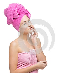 Beautiful girl in pink towel