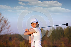 Beautiful girl play golf