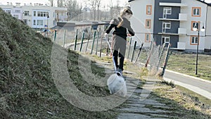 Beautiful girl playing with the dog