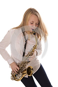 Beautiful girl playing the saxophone