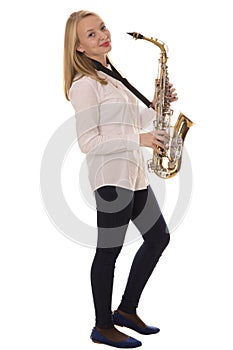 Beautiful girl playing the saxophone