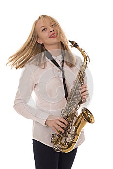 Beautiful girl playing the saxophone