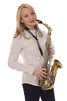 Beautiful girl playing the saxophone