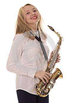 Beautiful girl playing the saxophone