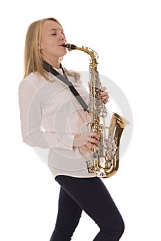 Beautiful girl playing the saxophone