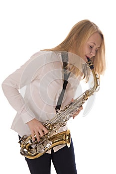 Beautiful girl playing the saxophone