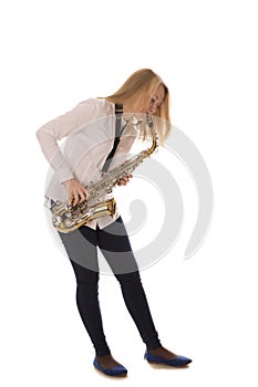 Beautiful girl playing the saxophone