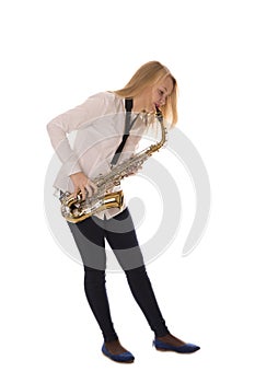 Beautiful girl playing the saxophone