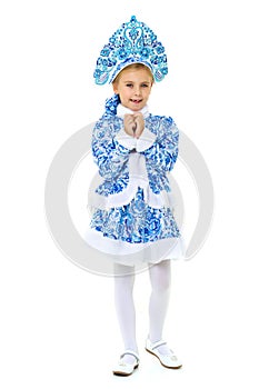 Beautiful girl posing in Snow Maiden costume