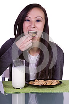 Beautiful Girl Pouring Milk to her Glass