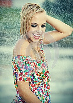 Beautiful girl in rain.
