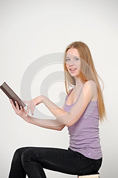 Beautiful girl reading book